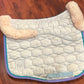Mattes medium sheepskin dressage pad light blue with lilac and teal trim and light pink sheepskin