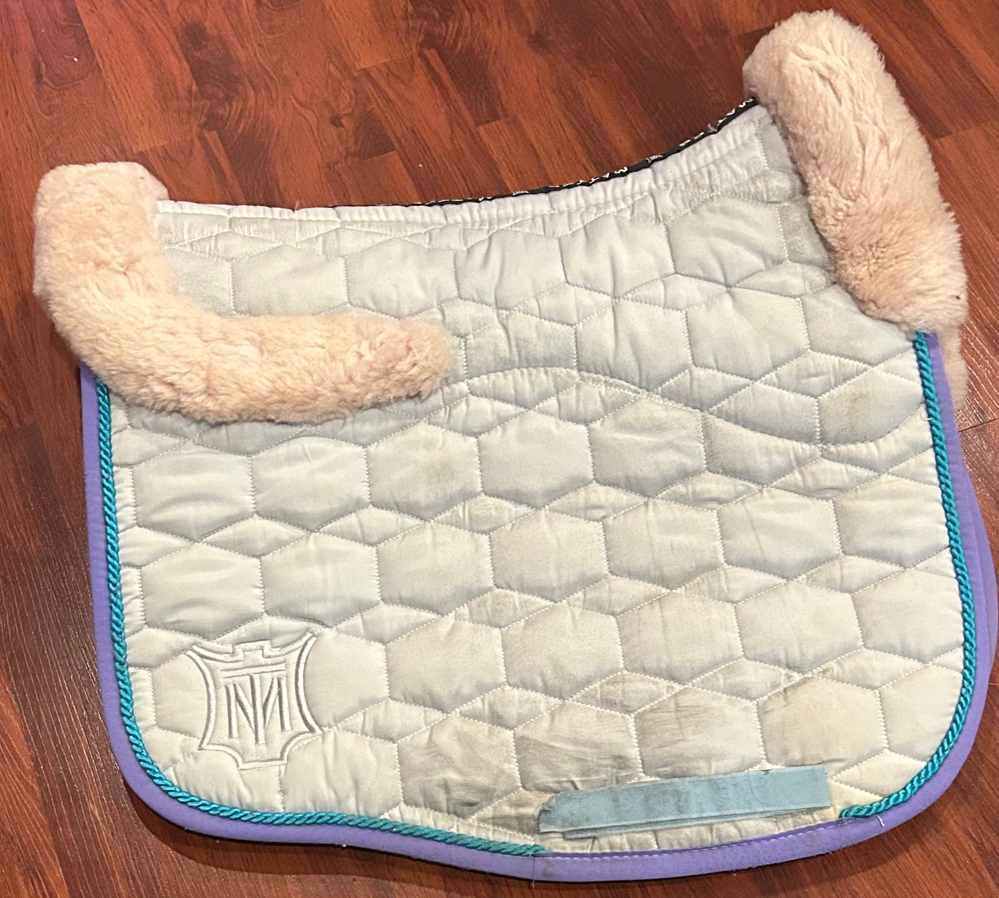 Mattes medium sheepskin dressage pad light blue with lilac and teal trim and light pink sheepskin