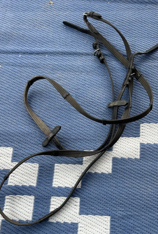 Black webbed reins lots of wear