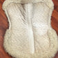 White half pad rolled fleece. Older measures 17” saddle area
