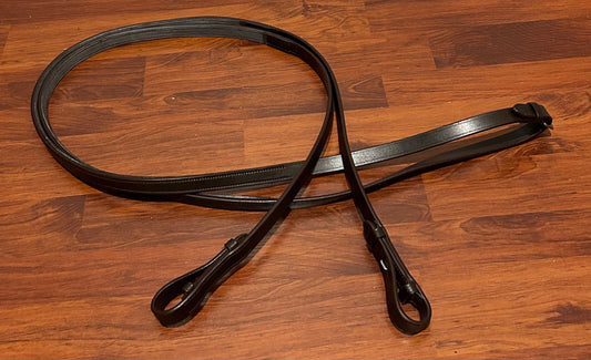 Brown rubber lined reins cob