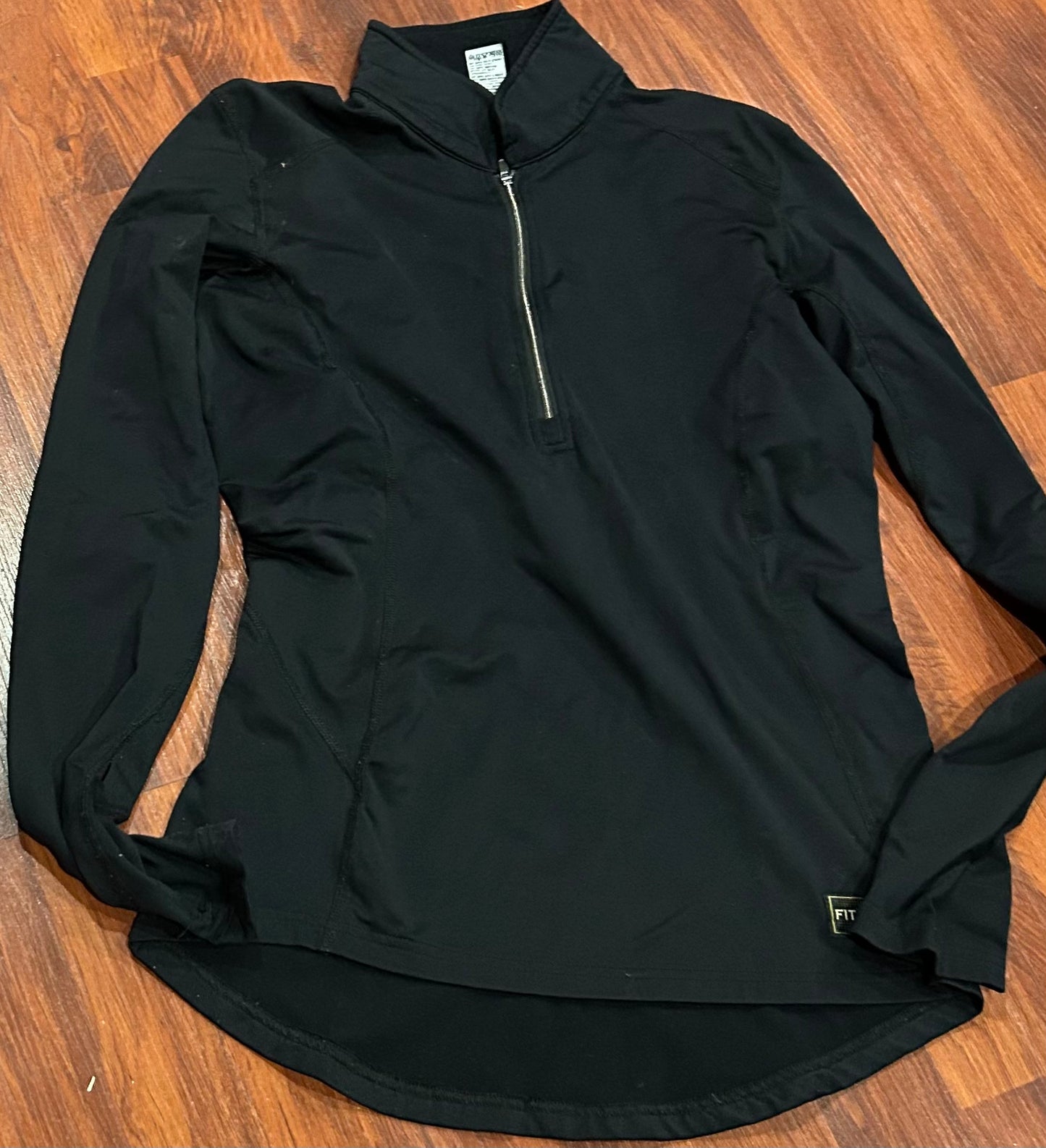 Fits medium 1/4 zip black long sleeve