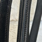 Black raised leather reins. Buckle closure. No slip thin rubber with hand stops