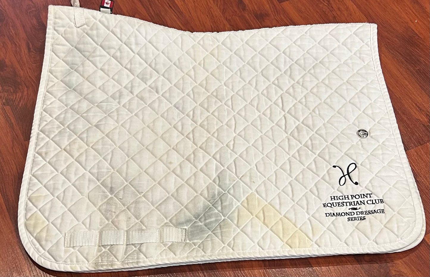 Ogilvy embroidered white dressage pad. Some stains