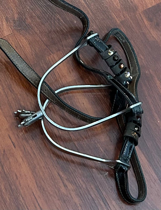 Herm Sprenger rowel spurs with brown patent / stones straps.