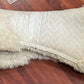 White half pad rolled fleece. Older measures 17” saddle area
