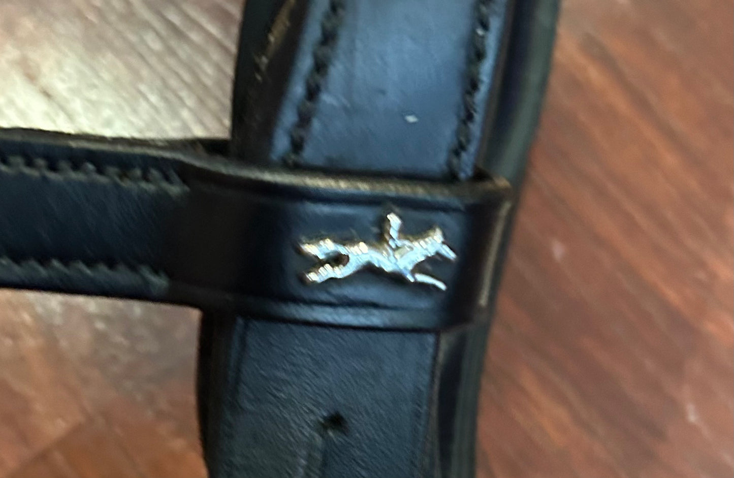 Schockemohle full size black patent rolled snaffle bridle