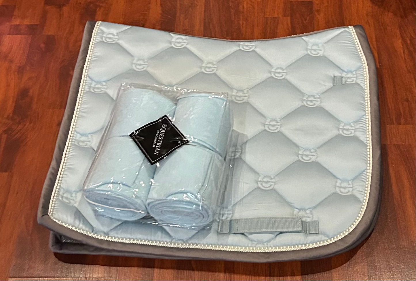 Equestrian Stockholm Ice Blue Dressage pad with matching polo wraps