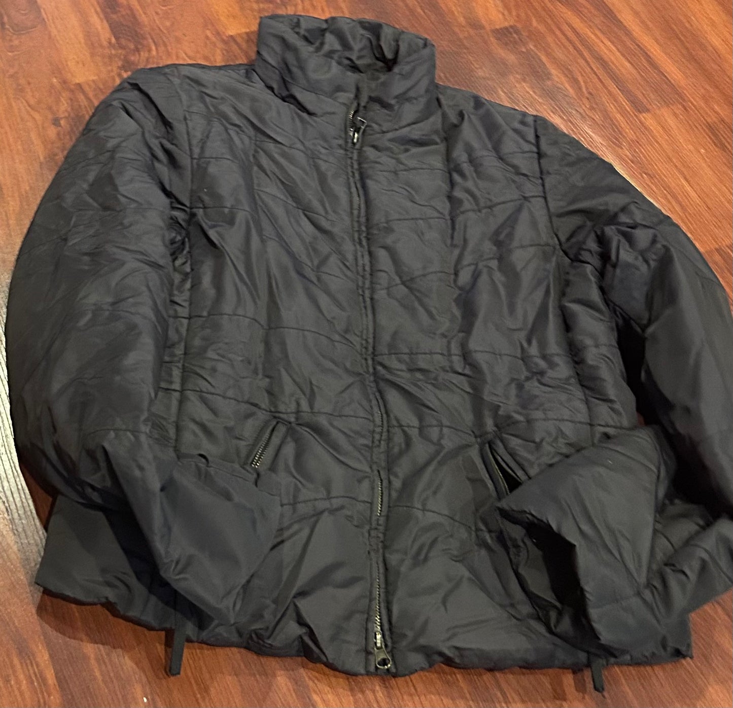 Iris Bauer medium brown puffy jacket.