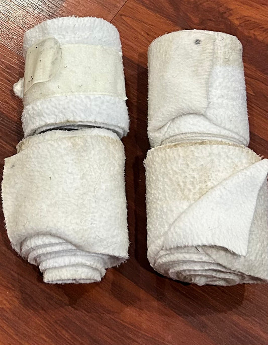 White polo wraps. Dirty. Set of 4
