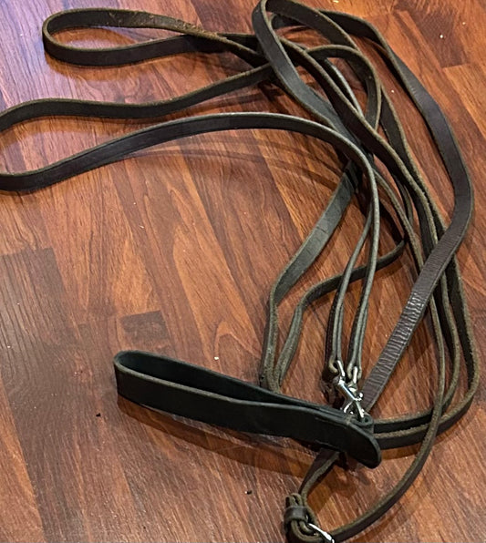 Brown leather draw reins with clips and girth attachment