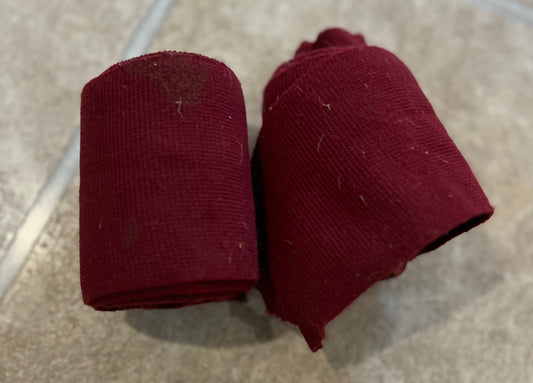 2 maroon stretchy bandages.