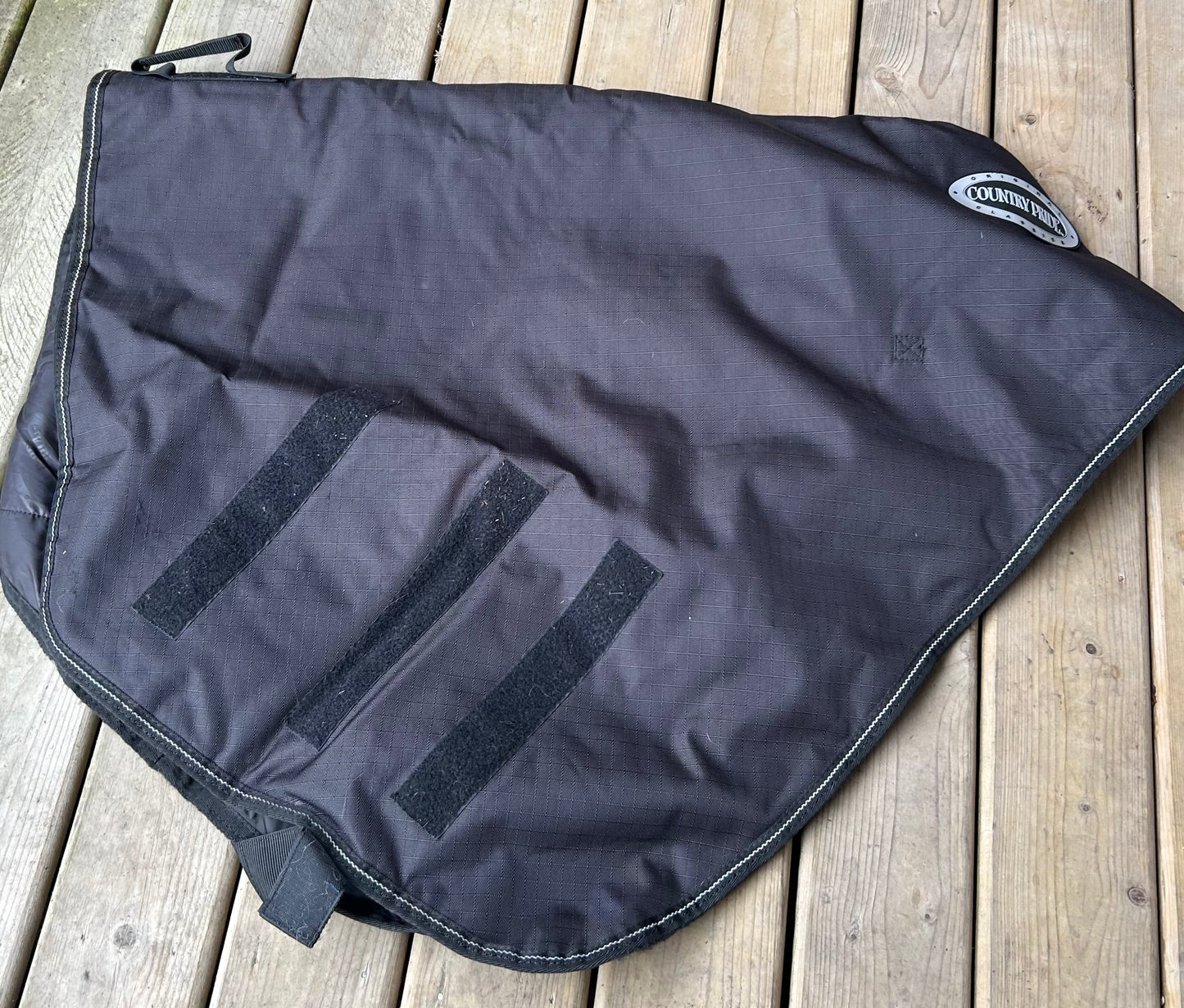 Country pride XL neck cover. New. Black. Est 200g fill