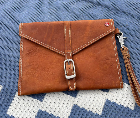 Brown leather bag hooks onto horn