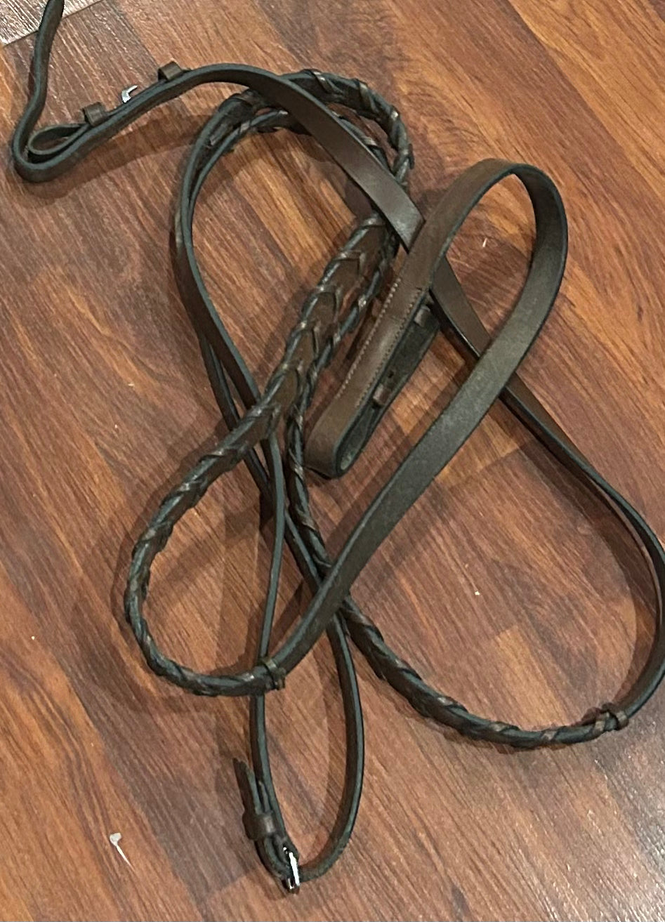 Soft brown braided reins. Hook closures