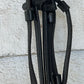 Black raised leather reins. Buckle closure. No slip thin rubber with hand stops
