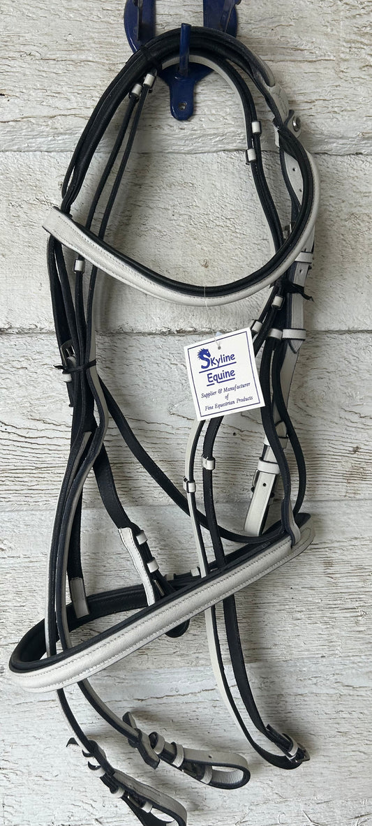 White bridle warmblood size black trim. With reins