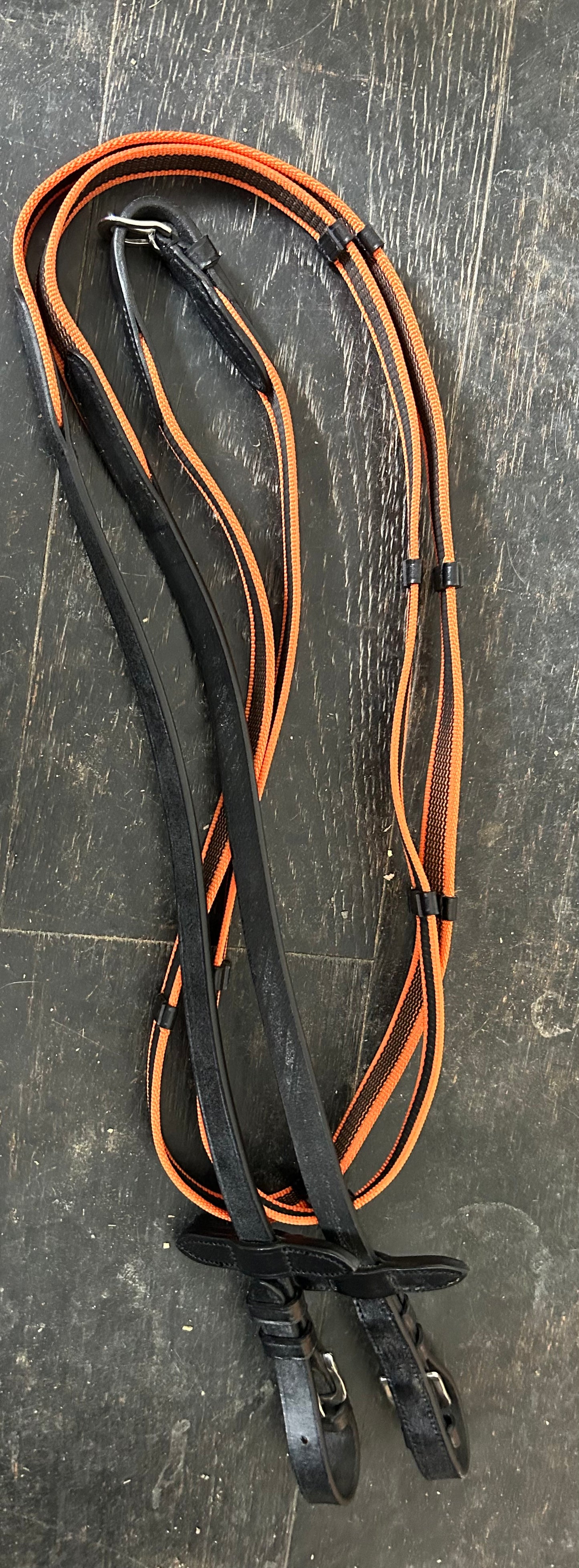 Black and orange rubber reins