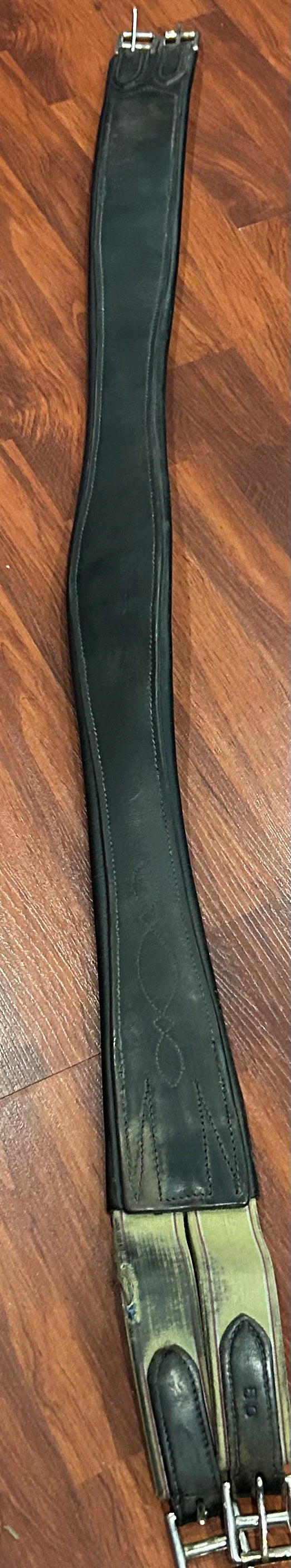 50” brown girth. Elastic one end. Minor damage to elastic