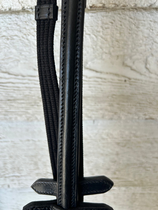 Black reins buckle closure, raised leather. Nylon with stops. Brand new