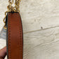 Brown leather lead with chain.