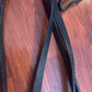Rubber grip black reins. Brass buckle ends