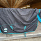 69” Weatherbeeta freestyle rain sheet. Black and teal. Minor lining rips