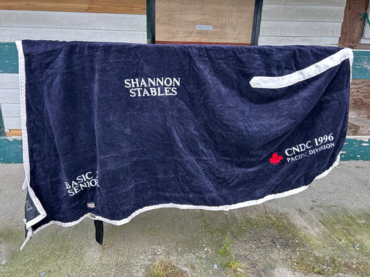 80” blue Wilsun’s wool cooler. Feels more like terry cloth. Embroidered.